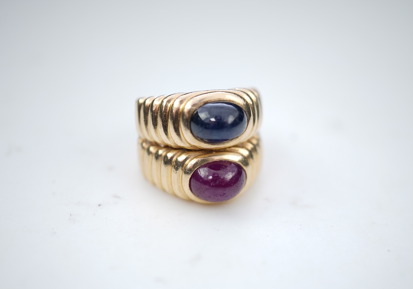 A sapphire and ruby ring